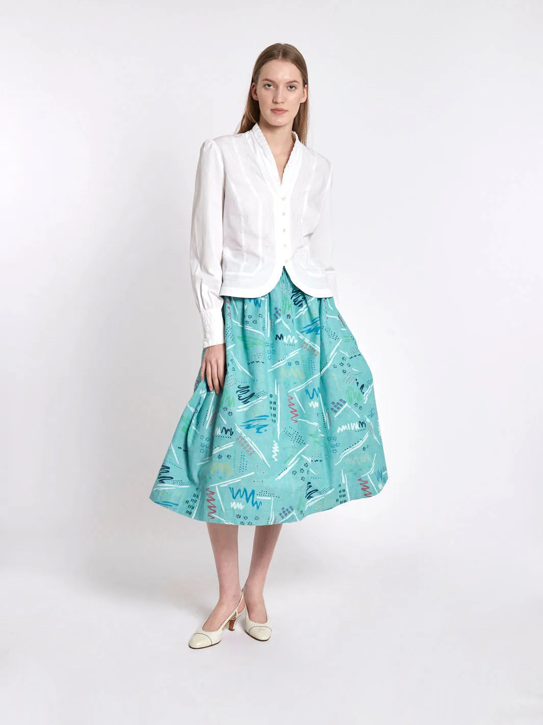 1950s inspired midi skirt in teal cotton with abstract pattern